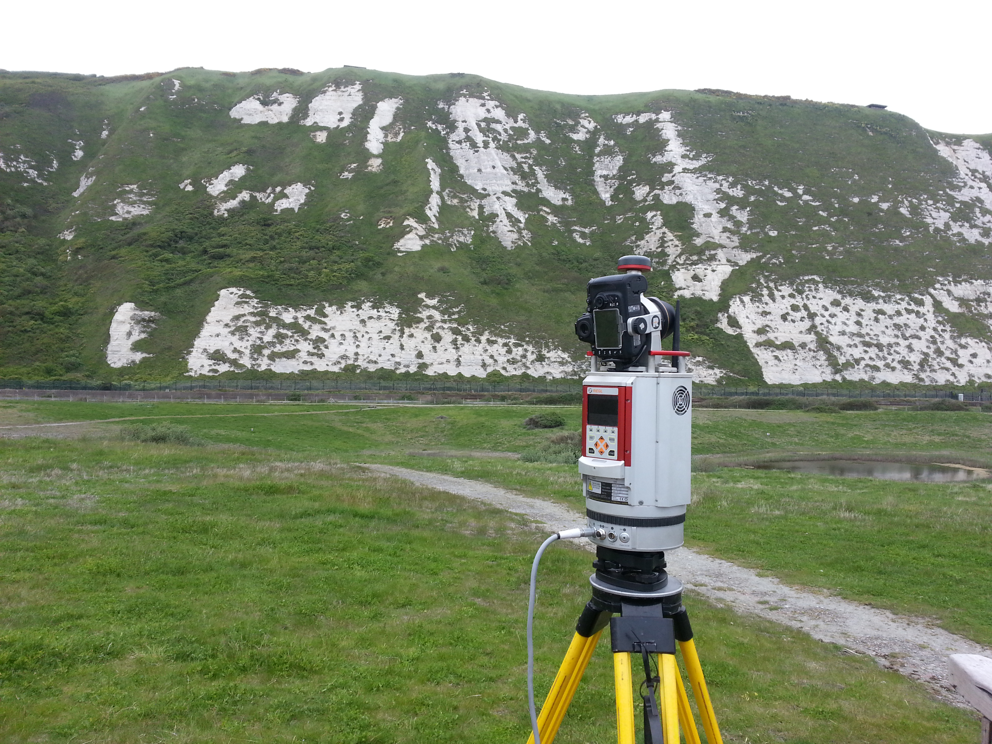 3D laser scanner pointed towards land for surveying